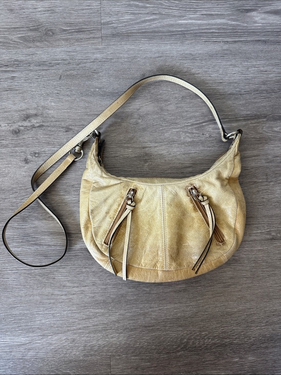 Fossil Handbags - Fossil Leather Crescent Shoulder Bag with Tassel Accents